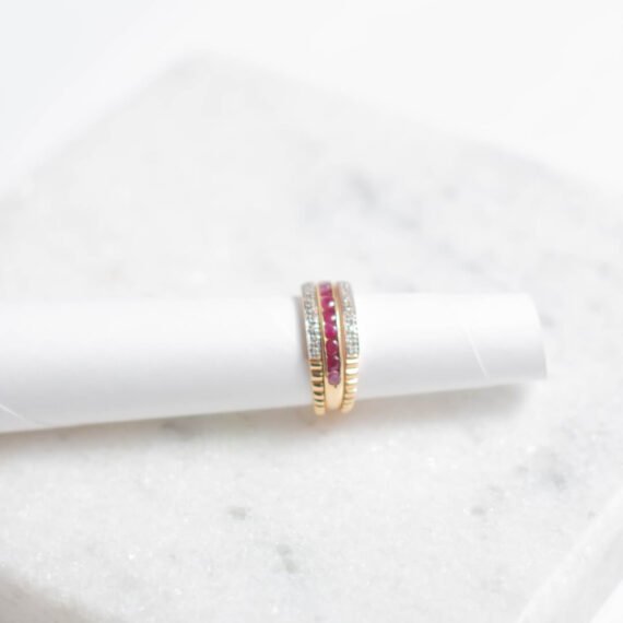Anillo de Oro 18k con diamante central de 8 puntos