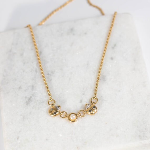 Collar de mariquitas de Oro 18k con perla central